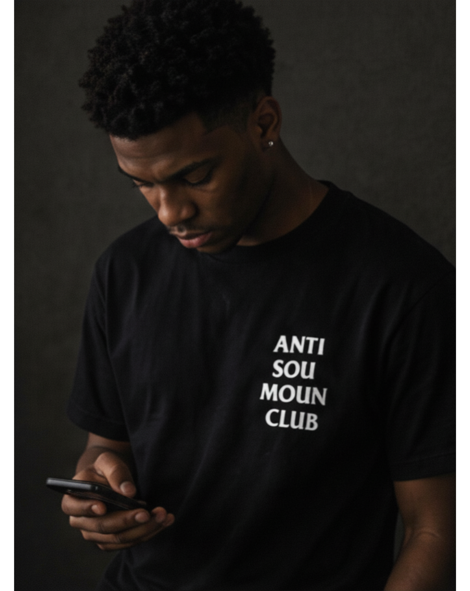 Model wearing black ANTI SOU MOUN CLUB heavyweight tee front view